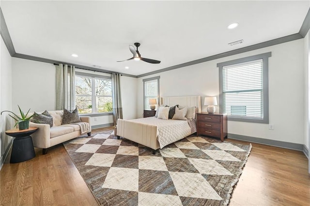 2357 Lynn Iris Dr, Decatur, GA 30032 - bedroom with visible vents, crown molding, baseboards, and wood finished floors