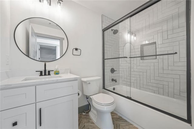 2357 Lynn Iris Dr, Decatur, GA 30032 - full bathroom featuring combined bath / shower with glass door, toilet, and vanity