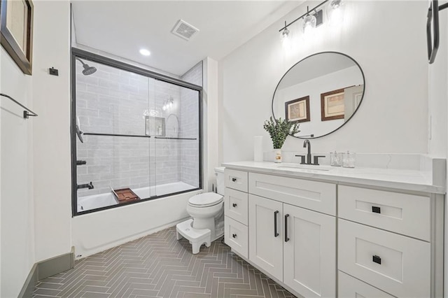 2357 Lynn Iris Dr, Decatur, GA 30032 - full bathroom with vanity, recessed lighting, toilet, bath / shower combo with glass door, and visible vents