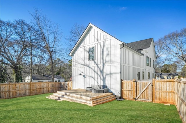 2357 Lynn Iris Dr, Decatur, GA 30032 - back of property featuring a wooden deck, board and batten siding, a yard, and a fenced backyard