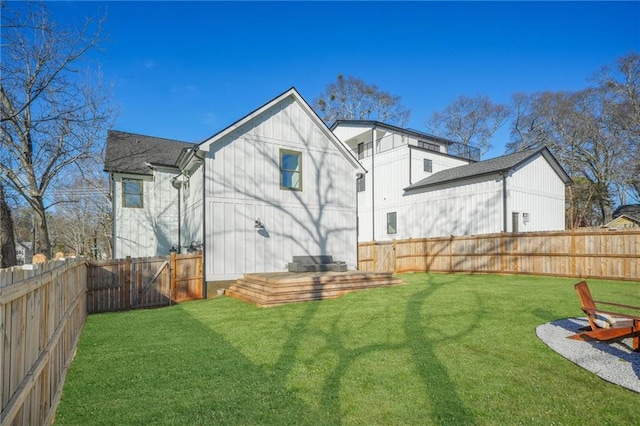 2357 Lynn Iris Dr, Decatur, GA 30032 - back of house with a fenced backyard and a yard