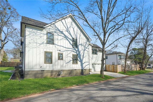 2357 Lynn Iris Dr, Decatur, GA 30032 - view of side of home featuring a yard, driveway, crawl space, and fence