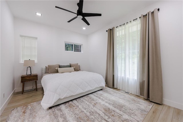 bedroom featuring visible vents, baseboards, ceiling fan, recessed lighting, and light wood-style flooring