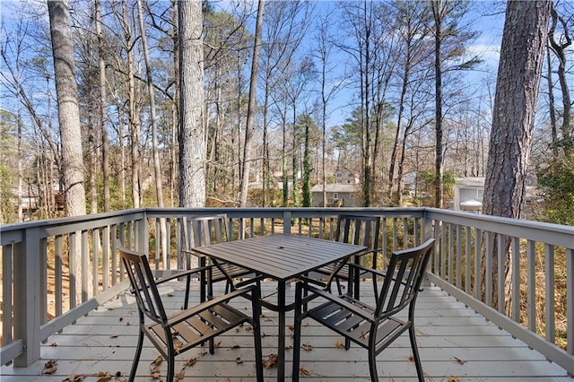 deck with outdoor dining space