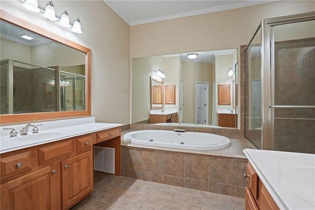 bathroom with vanity, plus walk in shower, ornamental molding, and tile patterned floors