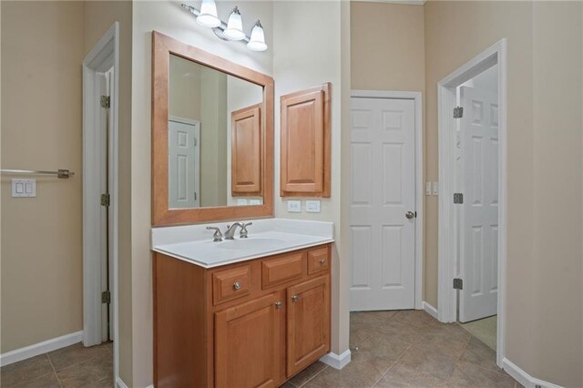 bathroom featuring vanity and tile patterned flooring