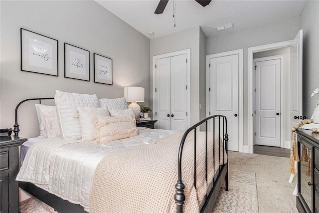 1865 Henley Way, Alpharetta, GA 30009 - bedroom featuring light colored carpet, a closet, ceiling fan, and baseboards