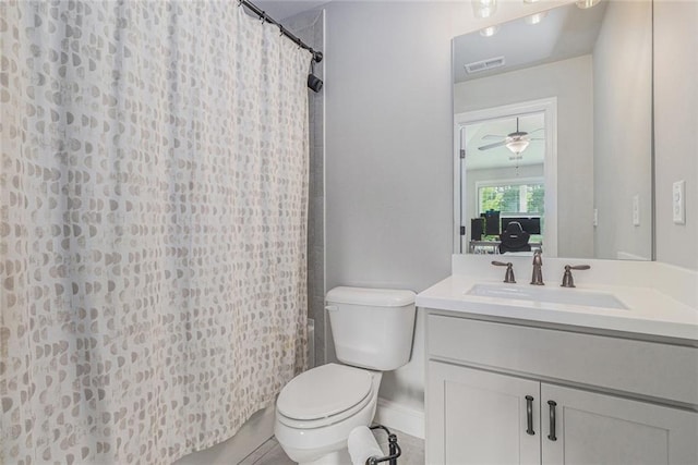 1865 Henley Way, Alpharetta, GA 30009 - full bathroom featuring toilet, vanity, curtained shower, and a ceiling fan