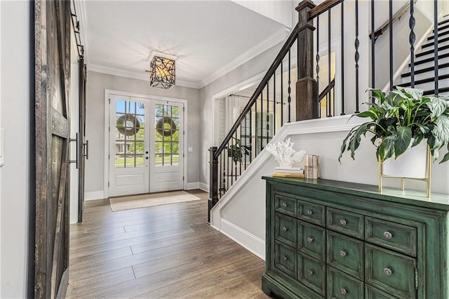 1865 Henley Way, Alpharetta, GA 30009 - foyer with stairway, french doors, baseboards, wood finished floors, and crown molding