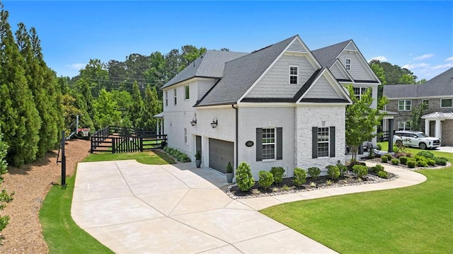 1865 Henley Way, Alpharetta, GA 30009 - view of front of house featuring a front yard, a garage, and driveway
