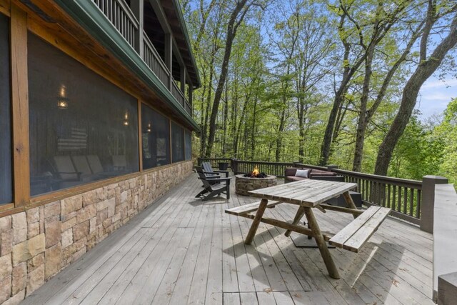 852 Black Bear Den Rd, Clayton, GA 30525 - wooden terrace featuring an outdoor living space with a fire pit