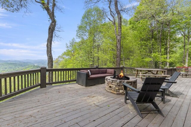 852 Black Bear Den Rd, Clayton, GA 30525 - deck with an outdoor fire pit