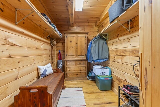 852 Black Bear Den Rd, Clayton, GA 30525 - living area with lofted ceiling with beams, wood ceiling, and wooden walls