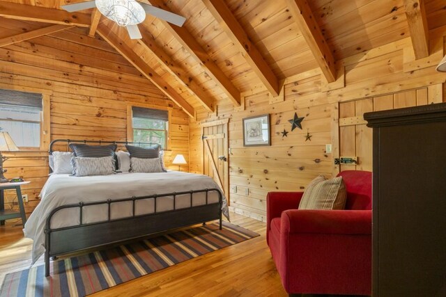 852 Black Bear Den Rd, Clayton, GA 30525 - bedroom with wooden walls and multiple windows