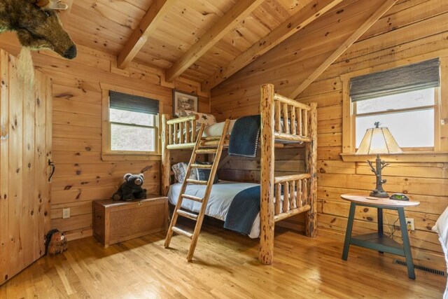 852 Black Bear Den Rd, Clayton, GA 30525 - full bathroom featuring wooden walls, vanity, toilet, and a shower with shower curtain