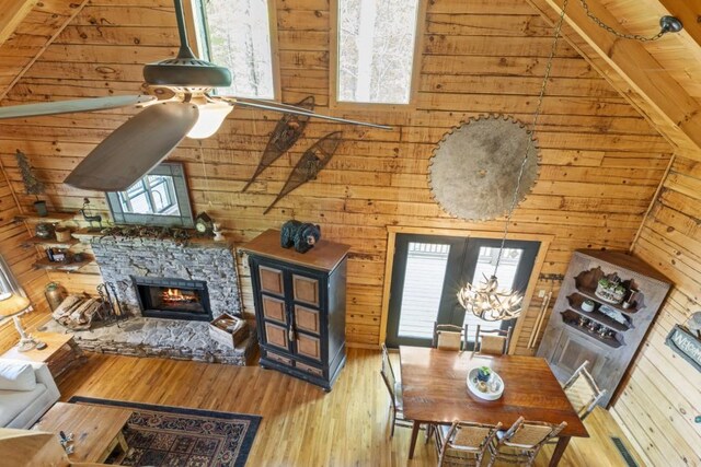 852 Black Bear Den Rd, Clayton, GA 30525 - stairs with wood walls, stone finish floor, and visible vents