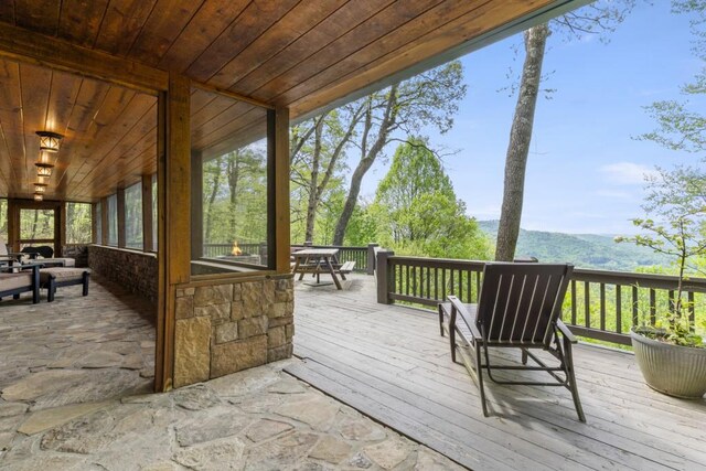 852 Black Bear Den Rd, Clayton, GA 30525 - deck with an outdoor fire pit