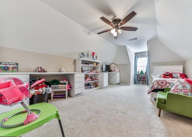 bedroom with visible vents, baseboards, ceiling fan, and light carpet
