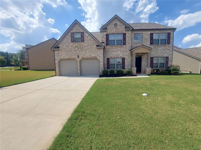 view of front of home featuring a garage and a front lawn