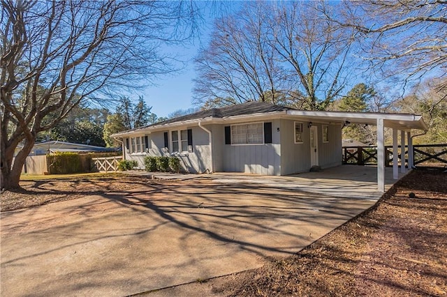 single story home with a carport