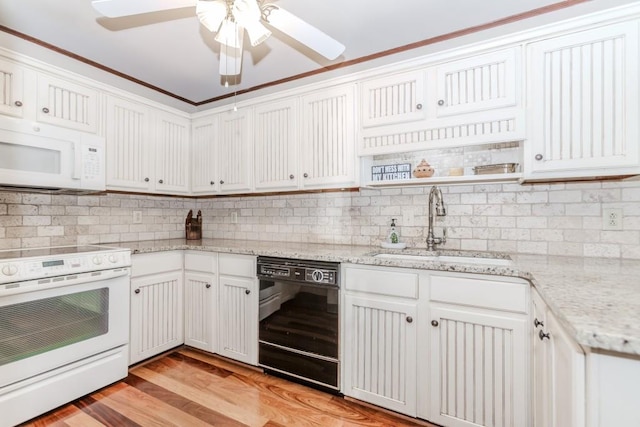 529 Arnold Rd, Lawrenceville, GA 30044 - kitchen with white appliances, a sink, backsplash, a ceiling fan, and white cabinetry