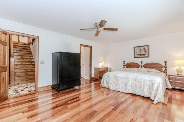 529 Arnold Rd, Lawrenceville, GA 30044 - bedroom featuring light wood-style floors, crown molding, and a ceiling fan