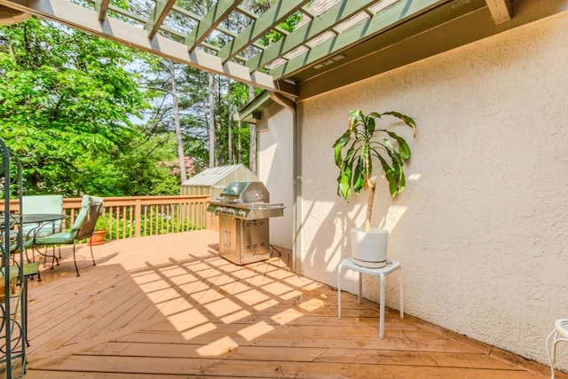 529 Arnold Rd, Lawrenceville, GA 30044 - deck with grilling area, a pergola, and outdoor dining area