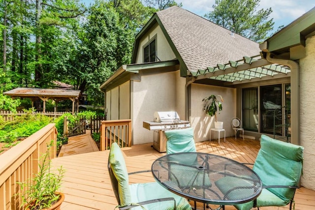 529 Arnold Rd, Lawrenceville, GA 30044 - wooden terrace featuring grilling area and outdoor dining area