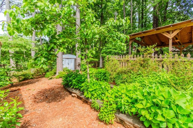 529 Arnold Rd, Lawrenceville, GA 30044 - view of yard featuring fence and a garden