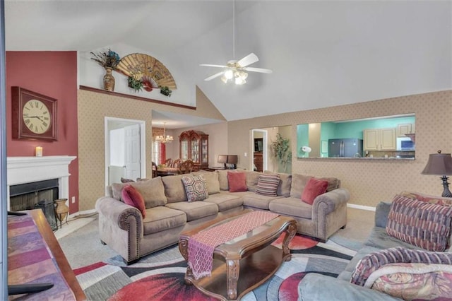 4969 Truitt Ln, Decatur, GA 30035 - living area with wallpapered walls, a chandelier, a ceiling fan, light colored carpet, and baseboards