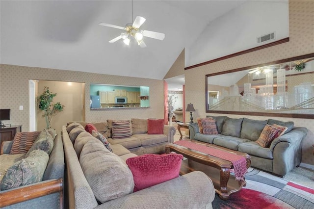 4969 Truitt Ln, Decatur, GA 30035 - carpeted living area featuring wallpapered walls, ceiling fan, and lofted ceiling