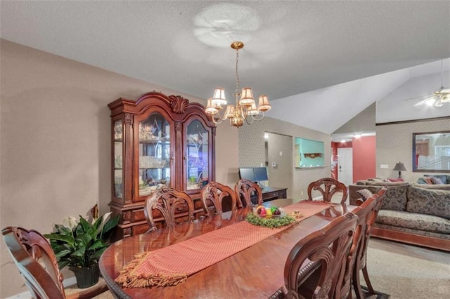4969 Truitt Ln, Decatur, GA 30035 - dining area featuring a chandelier, lofted ceiling, a textured ceiling, and a ceiling fan