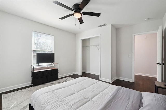 bedroom featuring a closet, ceiling fan, and hardwood / wood-style flooring