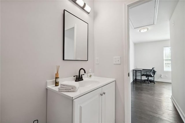 bathroom featuring vanity and wood-type flooring