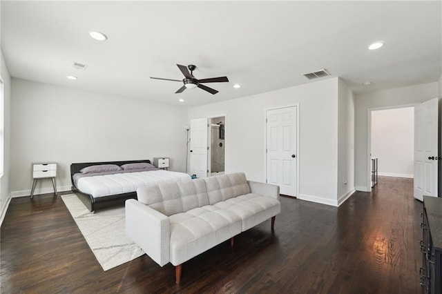 bedroom featuring ceiling fan and dark hardwood / wood-style flooring