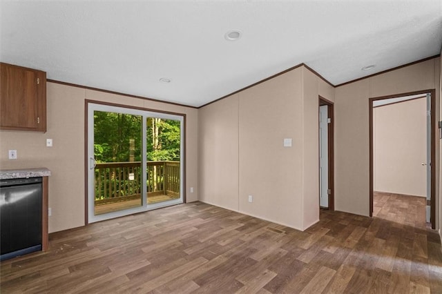 211 Fire Tower Rd NE, Calhoun, GA 30701 - unfurnished living room with wood finished floors and ornamental molding
