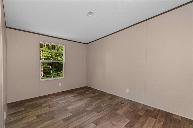 211 Fire Tower Rd NE, Calhoun, GA 30701 - spare room featuring wood finished floors and crown molding