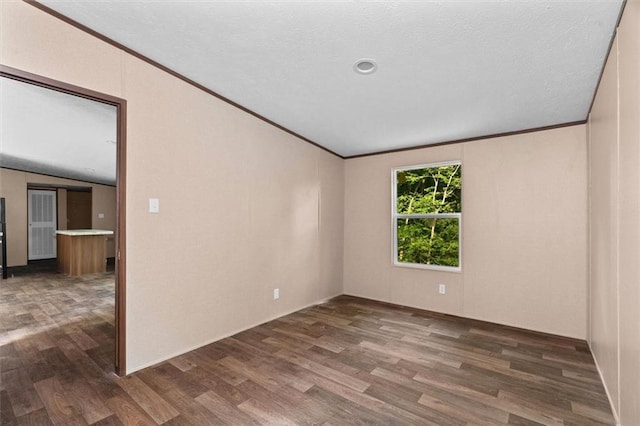 211 Fire Tower Rd NE, Calhoun, GA 30701 - spare room featuring wood finished floors and crown molding