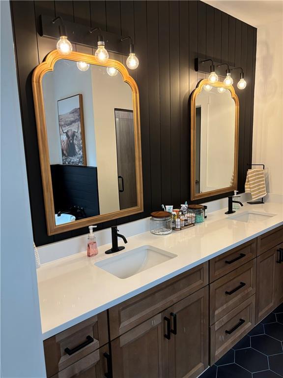 bathroom with vanity and tile patterned floors