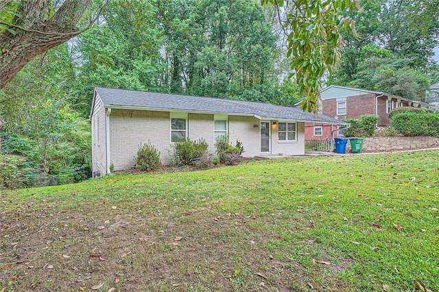 view of front of property with a front lawn