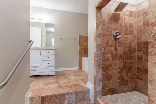 1615 Enchanted Forest Dr, Conley, GA 30288 - bathroom featuring baseboards, tiled shower, a garden tub, and vanity