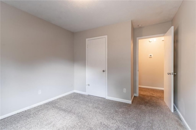 1615 Enchanted Forest Dr, Conley, GA 30288 - unfurnished bedroom featuring baseboards and carpet flooring