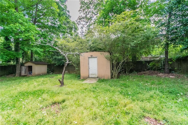 1615 Enchanted Forest Dr, Conley, GA 30288 - view of shed with a fenced backyard