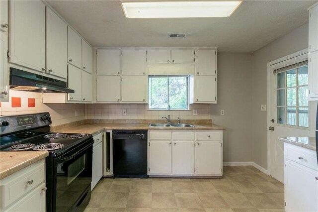 1615 Enchanted Forest Dr, Conley, GA 30288 - kitchen featuring a sink, backsplash, under cabinet range hood, visible vents, and black appliances