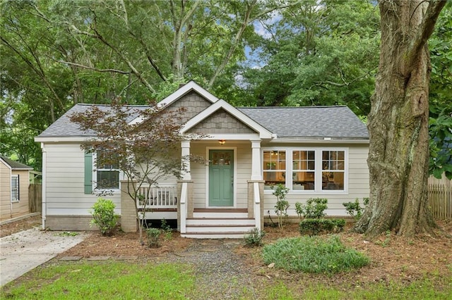 1735 Jobeth Ave SE, Atlanta, GA 30316 - view of front of house featuring roof with shingles and covered porch