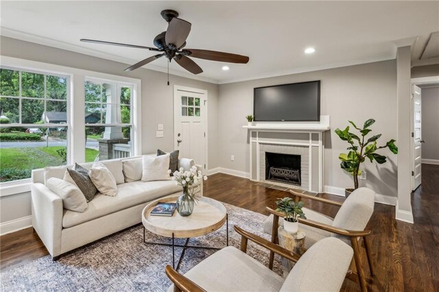 1735 Jobeth Ave SE, Atlanta, GA 30316 - living area with a ceiling fan, ornamental molding, wood finished floors, a brick fireplace, and recessed lighting