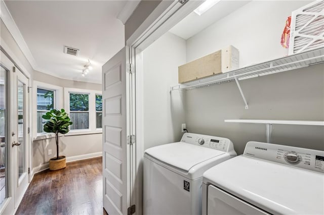1735 Jobeth Ave SE, Atlanta, GA 30316 - laundry area with separate washer and dryer and dark wood finished floors