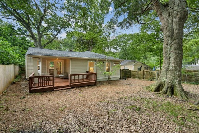 1735 Jobeth Ave SE, Atlanta, GA 30316 - back of house featuring french doors, a deck, and a fenced backyard