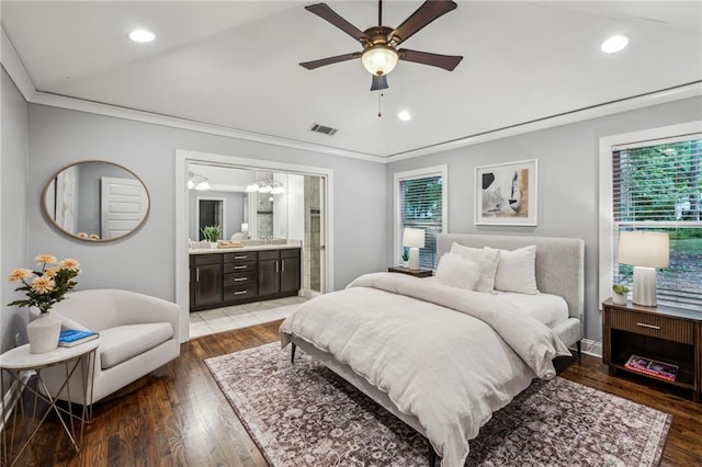 1735 Jobeth Ave SE, Atlanta, GA 30316 - bedroom featuring multiple windows, light wood-type flooring, recessed lighting, lofted ceiling, and ensuite bath