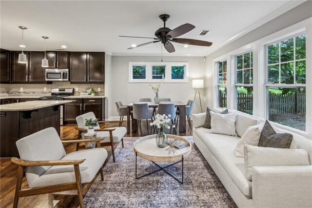 1735 Jobeth Ave SE, Atlanta, GA 30316 - living area with ceiling fan, dark wood-style floors, crown molding, and recessed lighting